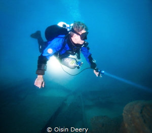 Diver on the wreck of the Dee Why Ferry at 45m (150 ft) d... by Oisin Deery 
